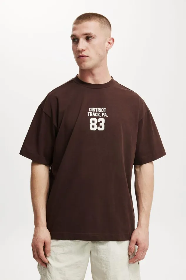 Cotton On Graphic TShirts Box Fit College TShirt Dark Oakdistrict Track 8211 Men