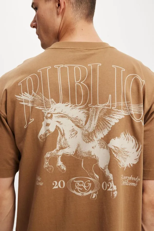 Cotton On Tees and Tanks Box Fit Graphic TShirt Burnt Almondpublic 8211 Men Cotton On Tees and Tanks Box Fit Graphic TShirt Burnt Almondpublic 8211 Men