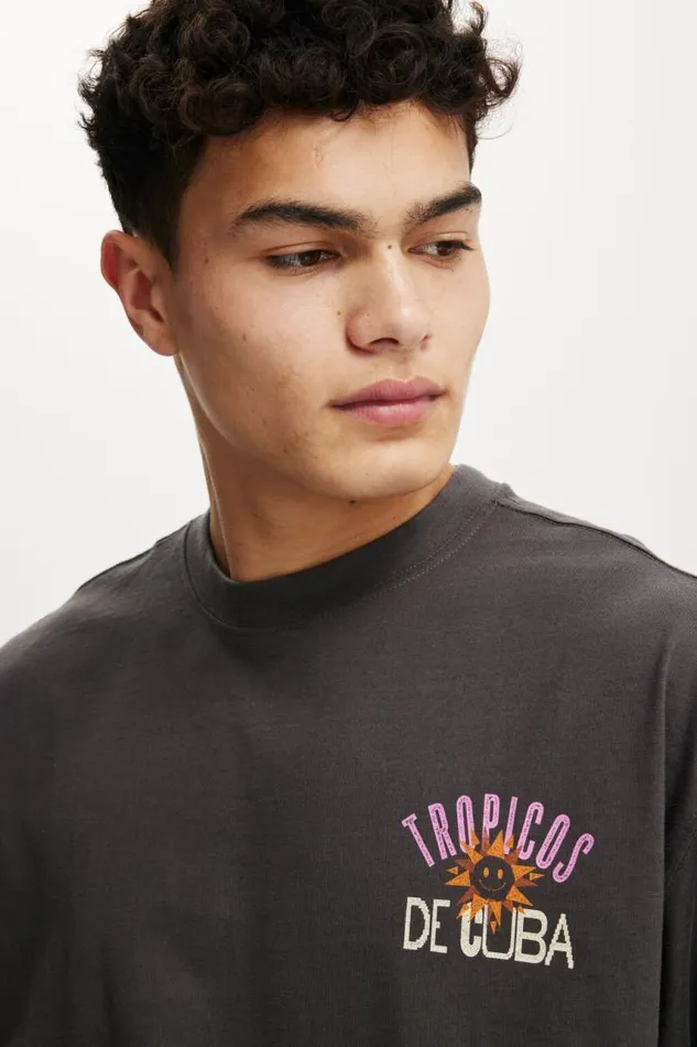 Cotton On Tees and Tanks Box Fit Graphic TShirt Faded Slatetropics 8211 Men Cotton On Tees and Tanks Box Fit Graphic TShirt Faded Slatetropics 8211 Men
