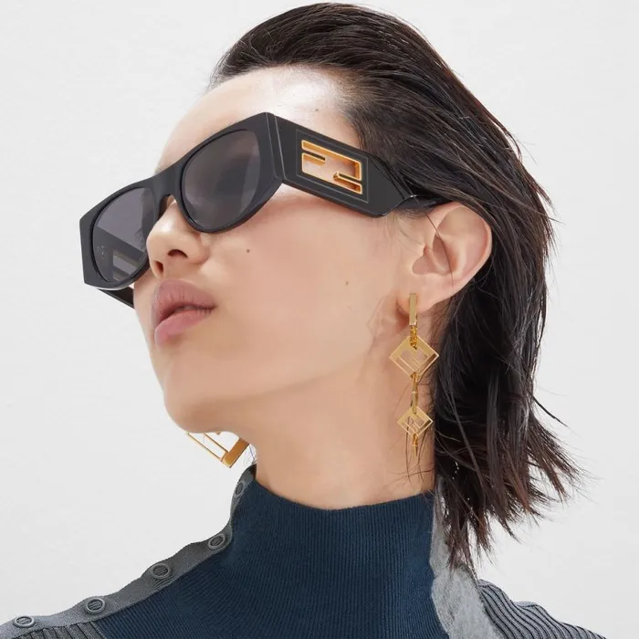 Woman GoldColoured Metal Earrings Gold Fendi Earring and Brooches